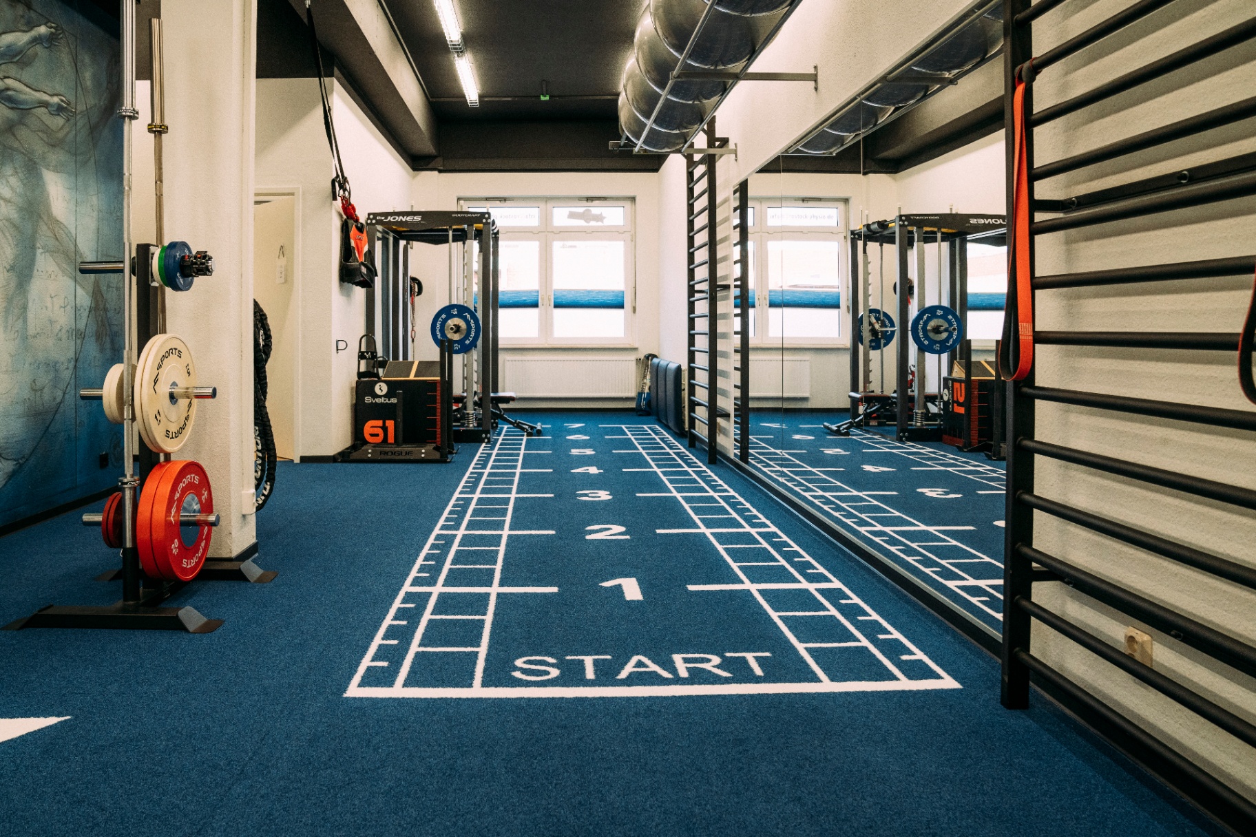 Trainingsraum mit Vitruvian-Wand